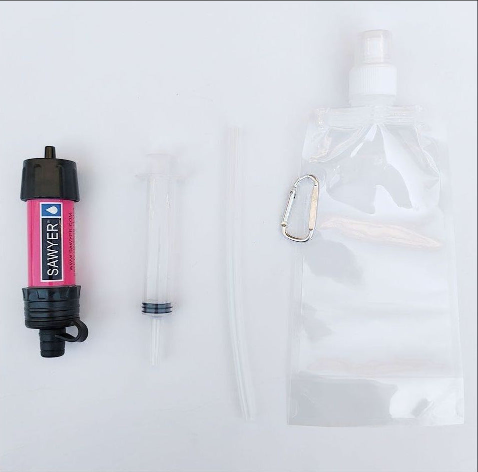 Sawyer water filter with a clear bag and carabiner on a white background