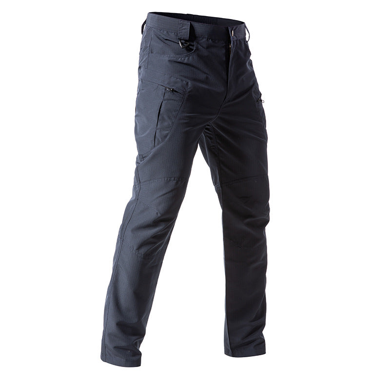Blue tactical pants on a white background