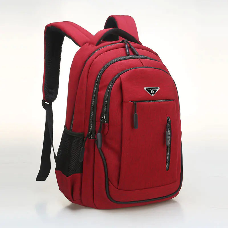Red backpack with black accents on a white background