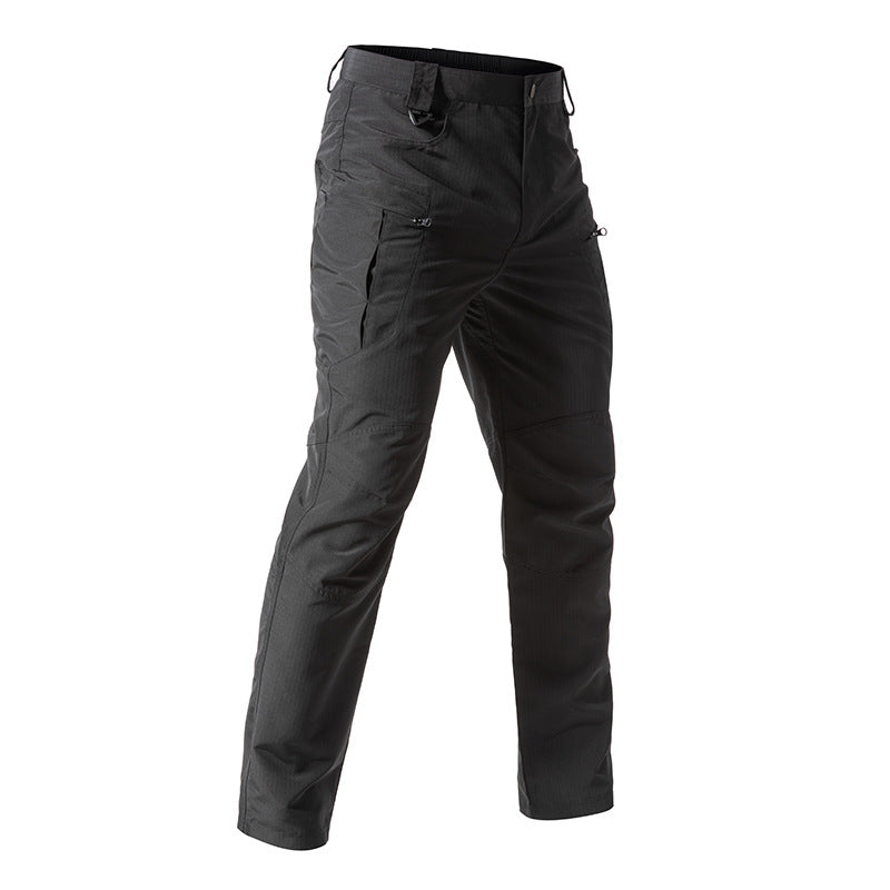 Black tactical pants on a white background