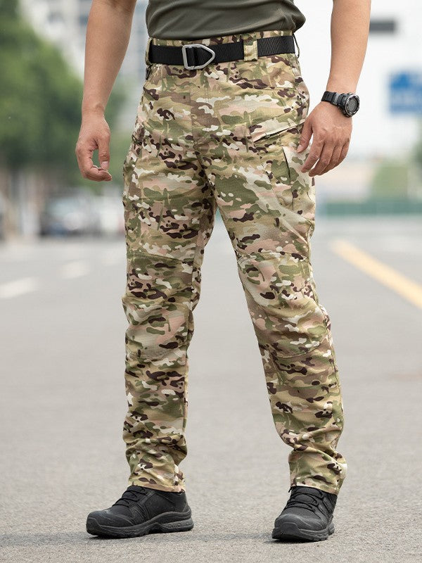 Person wearing camouflage pants on a street