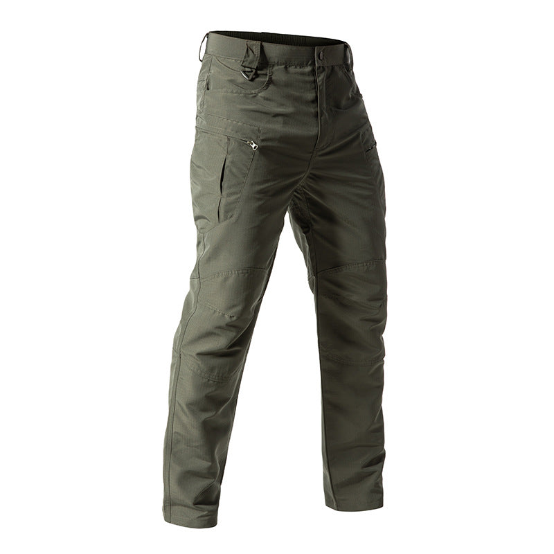 Green tactical pants on a white background